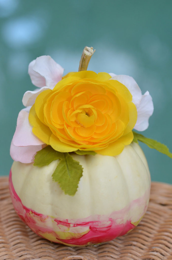 Marbleized Floral Pumpkins by Happy Family Blog  Our Marbleized Floral Pumpkins are a great project for all skill levels. These use nail polish and flowers to add pops of color to your fall decor.