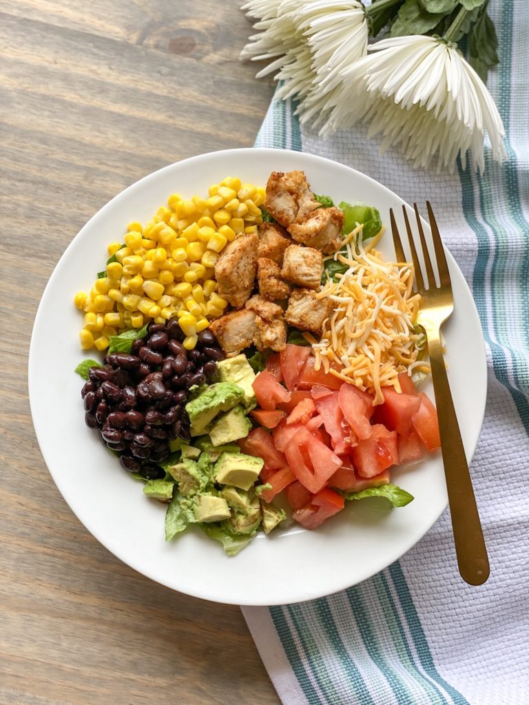 Learn tricks to have this ready in 15 minutes thanks to easy southwest salad ingredients like precooked chicken. 